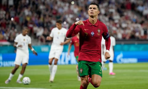 Juventus star Cristiano Ronaldo celebrates equalling Ali Daei's record for international goals for Portugal against France at Euro 2020.
