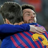 Gerard Pique and Lionel Messi at Barcelona.