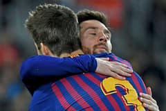 Gerard Pique and Lionel Messi at Barcelona.