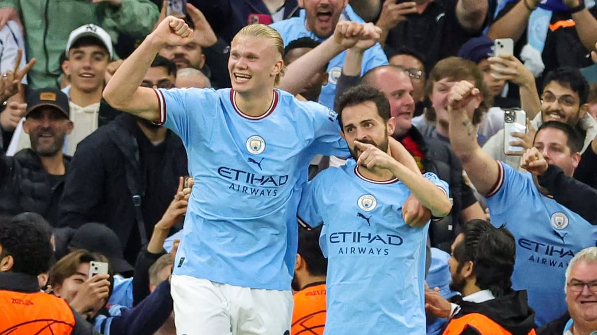 Erling Haaland and Bernardo Silva celebrate Man City scoring against Real Madrid