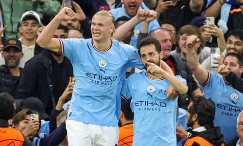 Erling Haaland and Bernardo Silva celebrate Man City scoring against Real Madrid