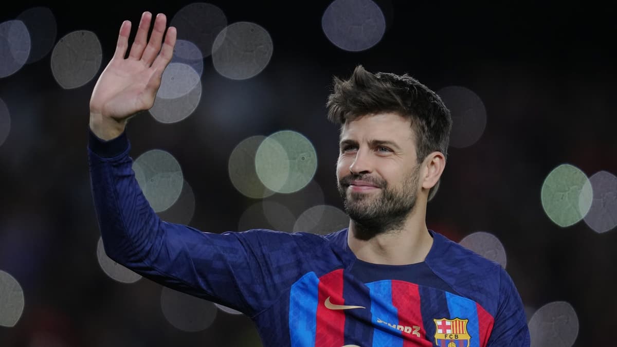Gerard Pique waves goodbye to the Barcelona fans as he retires