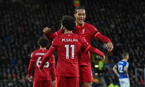 Mohamed Salah and Virgil van Dijk celebrate as Liverpool beat Everton