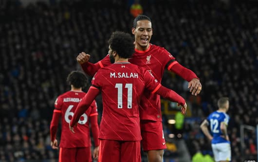 Mohamed Salah and Virgil van Dijk celebrate as Liverpool beat Everton