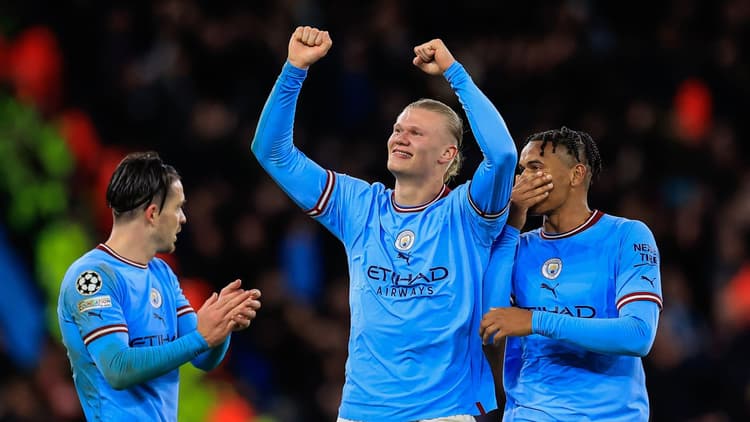 Erling Haaland celebrates scoring against Bayern Munich