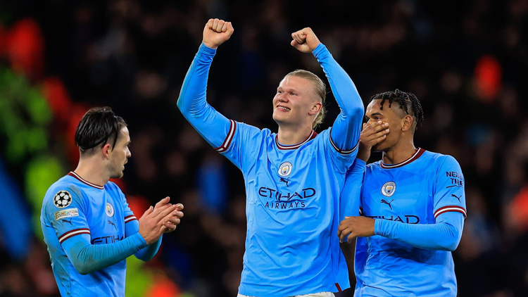 Erling Haaland celebrates scoring against Bayern Munich