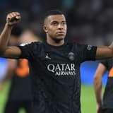 Kylian Mbappe celebrates scoring against Dortmund in the Champions League