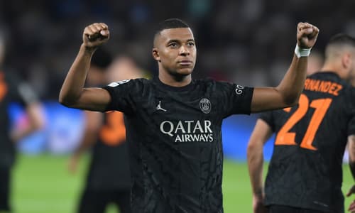 Kylian Mbappe celebrates scoring against Dortmund in the Champions League