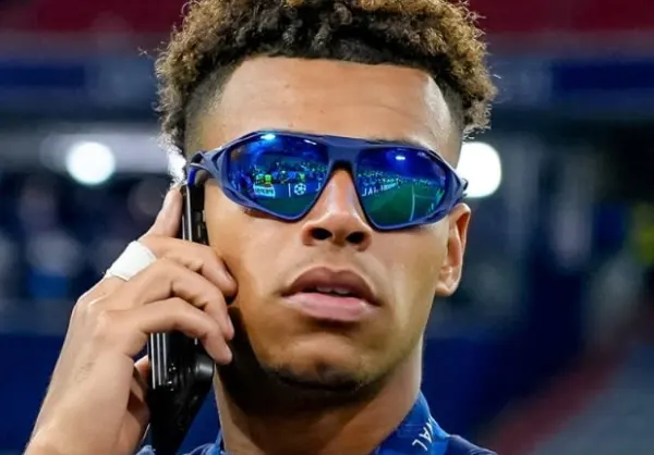 Desire Doue celebrates winning the Champions League with PSG