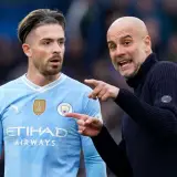 Pep Guardiola speaks to Jack Grealish after Man City draw 0-0 with Arsenal in the Premier League