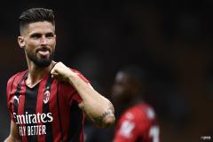 Olivier Giroud celebrates scoring for Milan against Cagliari in a Serie A match at the San Siro in 2021
