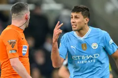 Rodri argues with a referee during Manchester City v Newcastle in the Premier League, 2023/24