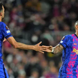 Busquets and Memphis in action for Barcelona.