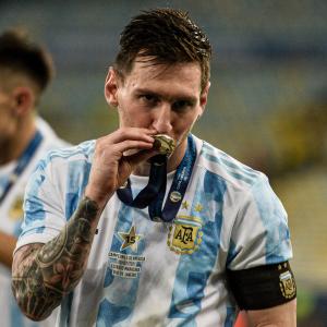 Lionel Messi with 2021 Copa America gold medal