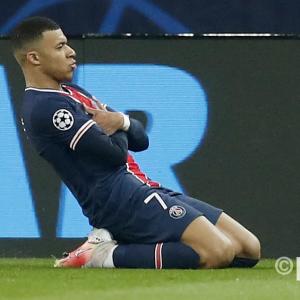 Kylian Mbappe celebrates scoring against Barcelona for PSG in the Champions League, 2020/21
