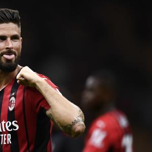 Olivier Giroud celebrates scoring for Milan against Cagliari in a Serie A match at the San Siro in 2021