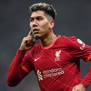 Roberto Firmino celebrates for Liverpool in their UCL win over Inter