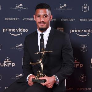 William Saliba with the Young Player of the Year award for Ligue 1, 2021/22
