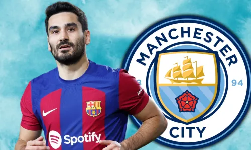 Ilkay Gundogan with the Man City crest