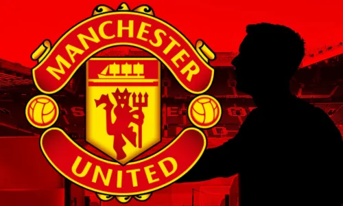 A black silhouette of Dean Henderson next to the Manchester United badge, set against a backdrop of a panorama of Old Trafford in red and black