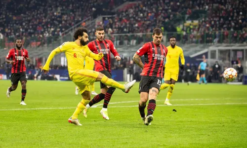 Liverpool's Mohamed Salah scores against Milan in the Champions League
