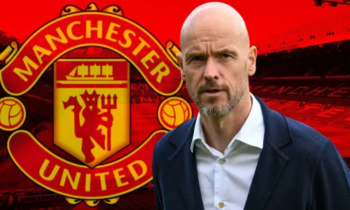 Erik ten Hag and the Manchester United badge, on a background of a panorama of Old Trafford in red