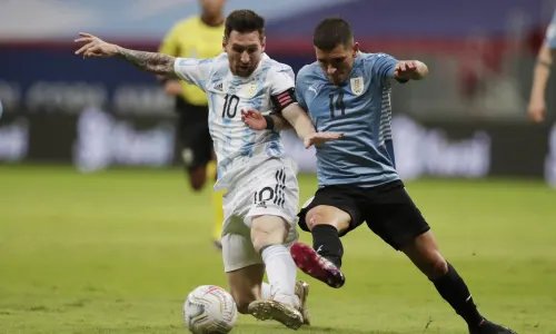 Barcelona's Lionel Messi challenges for possession playing for Argentina, Copa America 2021
