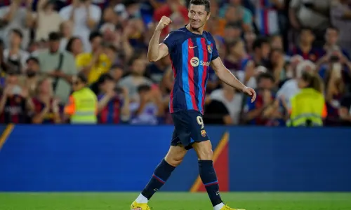 Robert Lewandowski celebrates a double for Barcelona against Valladolid