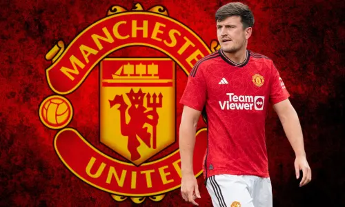 Harry Maguire and the Manchester United badge on a red and black abstract background