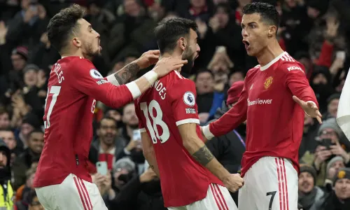 Cristiano Ronaldo and Manchester United players celebrate a goal in the 3-2 win over Arsenal