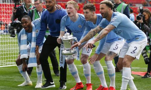 Manchester City players with the FA Cup.