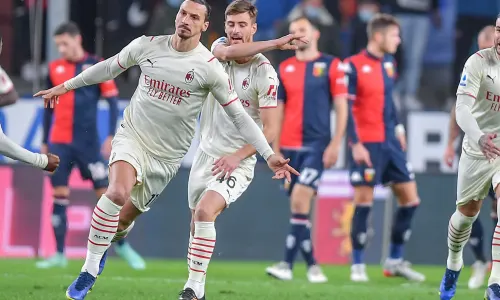 Zlatan Ibrahimovic celebrates scoring for AC Milan against Genoa in Serie A