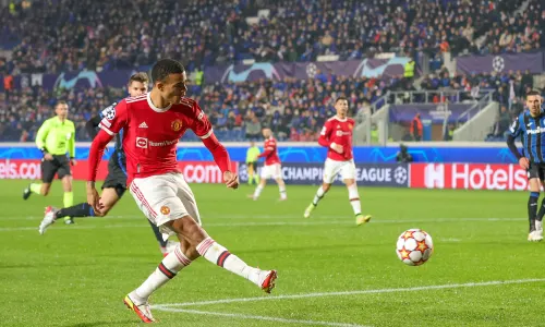 Mason Greenwood shoots at goal playing for Man Utd against Atalanta in the Champions League