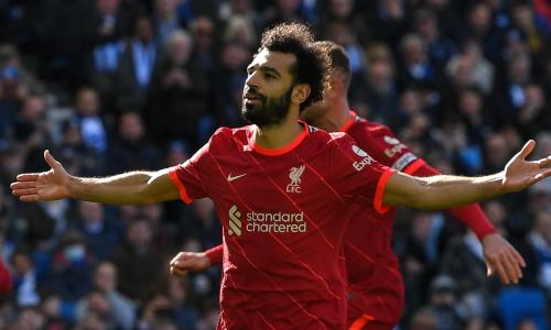 Mo Salah celebrates scoring against Brighton for Liverpool