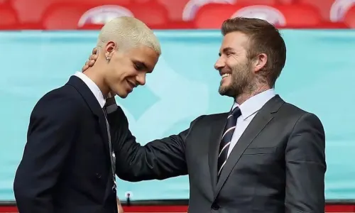 Romeo Beckham with Man Utd legend David Beckham