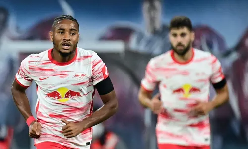 Nkunku and Gvardiol in action for RB Leipzig.