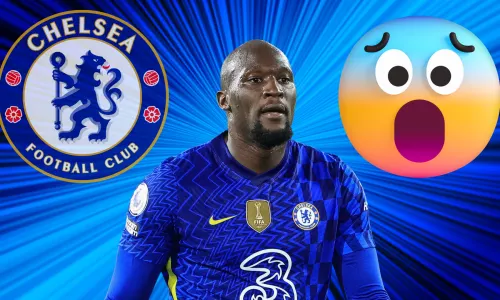 Romelu Lukaku in between the Chelsea badge and a shocked face emoji, set against a blue abstract background