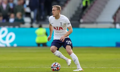 Tottenham Hotspur midfielder Oliver Skipp on the ball in a Premier League match against West Ham United at London Stadium in 2021.