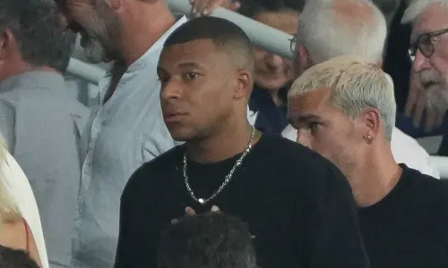 Kylian Mbappe watches France v New Zealand in the Rugby World Cup