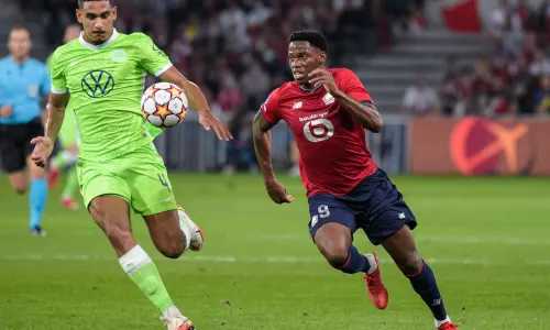 Jonathan David playing for Lille against Wolfsburg in the Champions League
