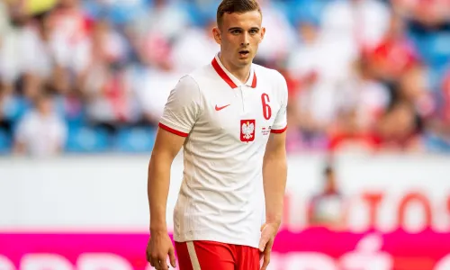 Kacper Kozlowski playing for Poland in a friendly against Iceland in 2021