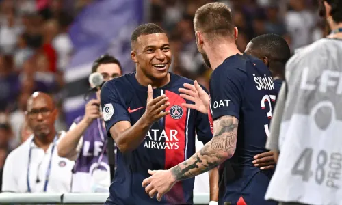 Kylian Mbappe celebrates scoring against Toulouse in Ligue 1, 2023/24