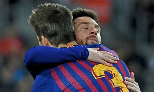 Gerard Pique and Lionel Messi at Barcelona.