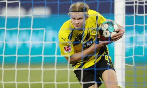 Erling Haaland celebrates a goal against Schalke