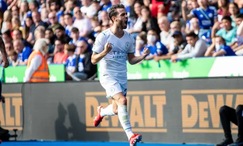 Bernardo Silva celebrates scoring for Manchester City in a Premier League match against Leicester City at the King Power Stadium in 2021