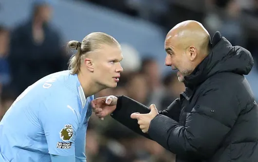 Erling Haaland and Pep Guardiola.