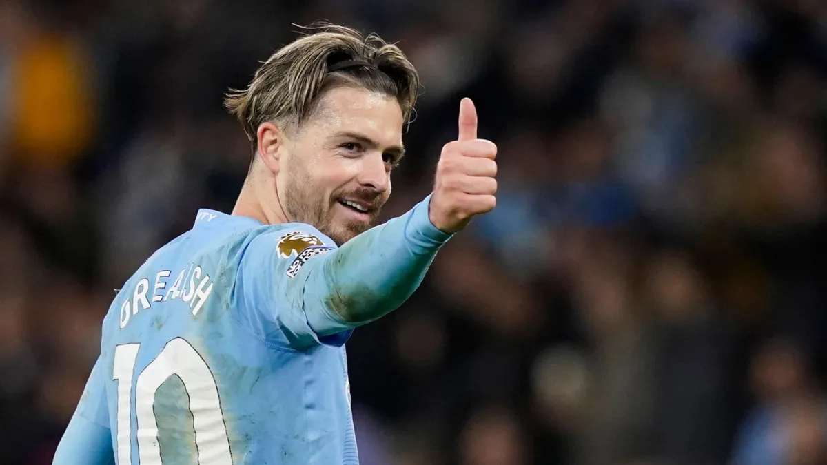 Jack Grealish gives the thumbs up during Man City's Premier League match with Aston Villa