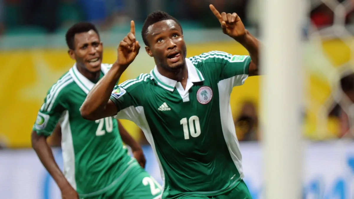 Chelsea midfielder Mikel Jon Obi celebrates scoring for Nigeria