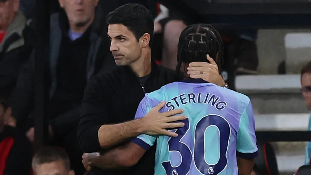 Arsenal's Raheem Sterling is consoled by Mikel Arteta after being replaced against Bournemouth