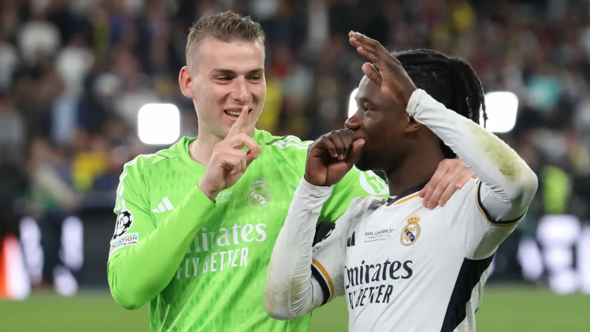 Andriy Lunin and Eduardo Camavinga of Real Madrid celebrate winning the 2023/24 Champions League